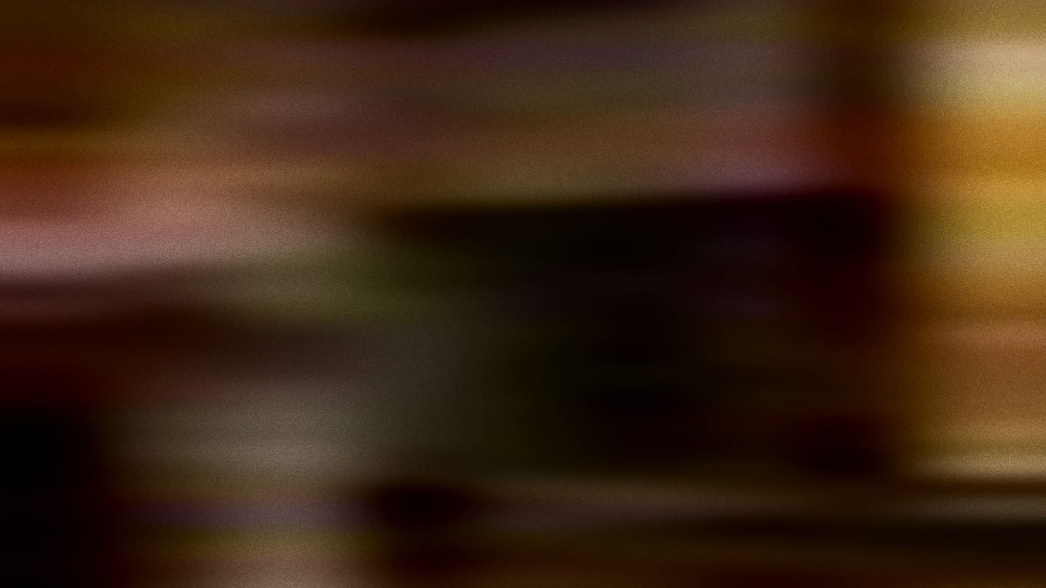 Abstract motion blur in dark amber and red